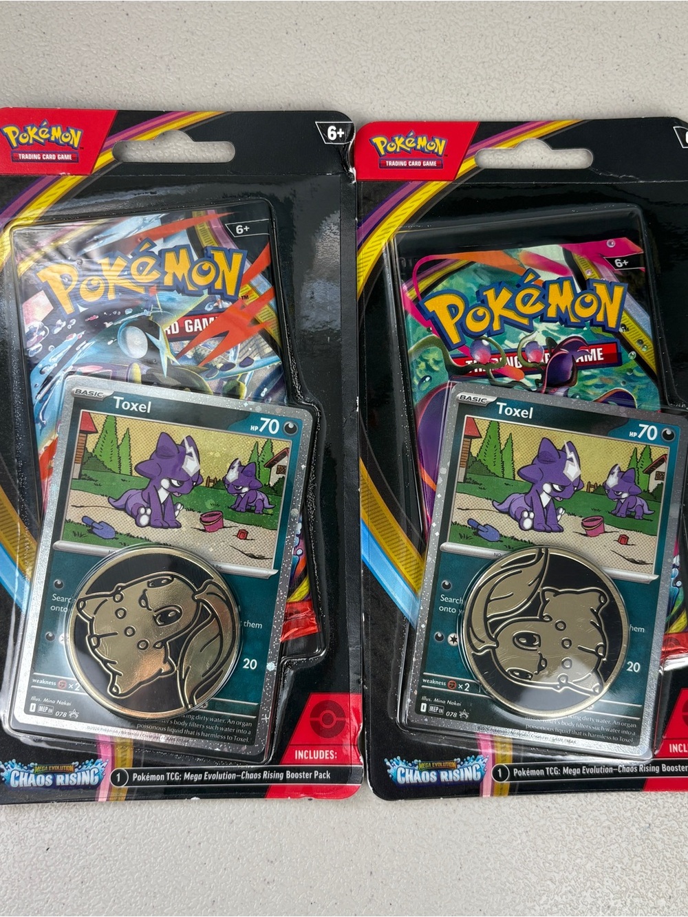 2x Pokémon TCG Chaos Rising Booster Pack with Toxel Promo Card & Chikorita Coin
